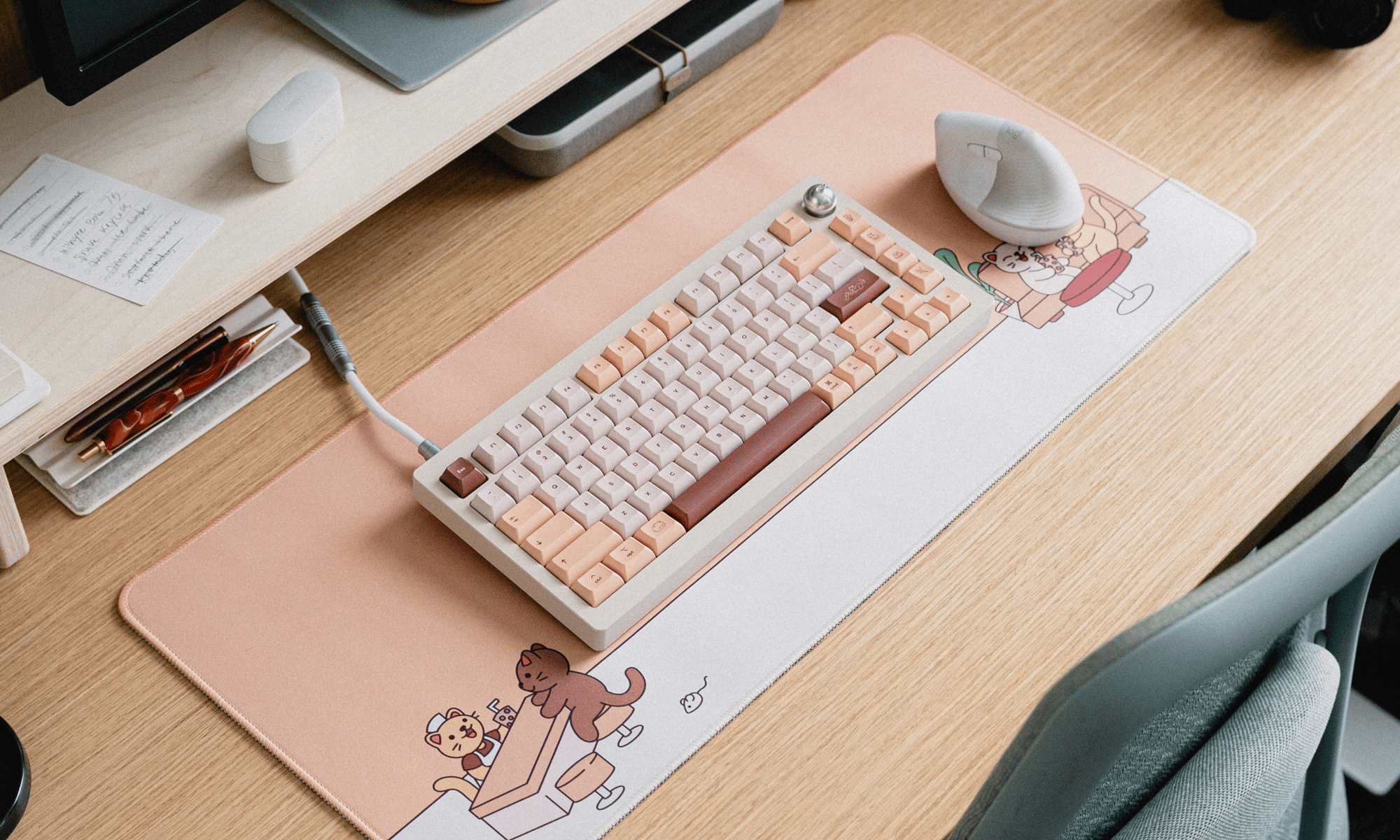 a desk setup with Sprout 75 next to a white vertical mouse on the brown sugar boba deskpad.